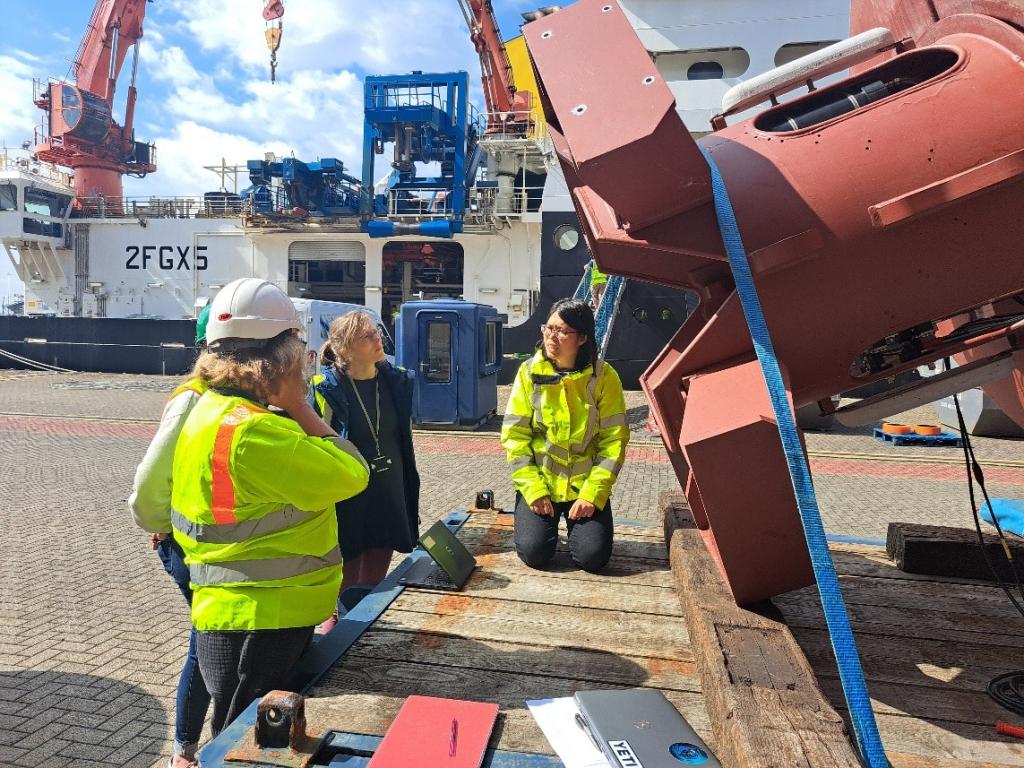 The NOC team setting up sensors in the keel of a surface ocean buoy that will be deployed for a year in 4,850 m water depth in the challenging NE Atlantic conditions.