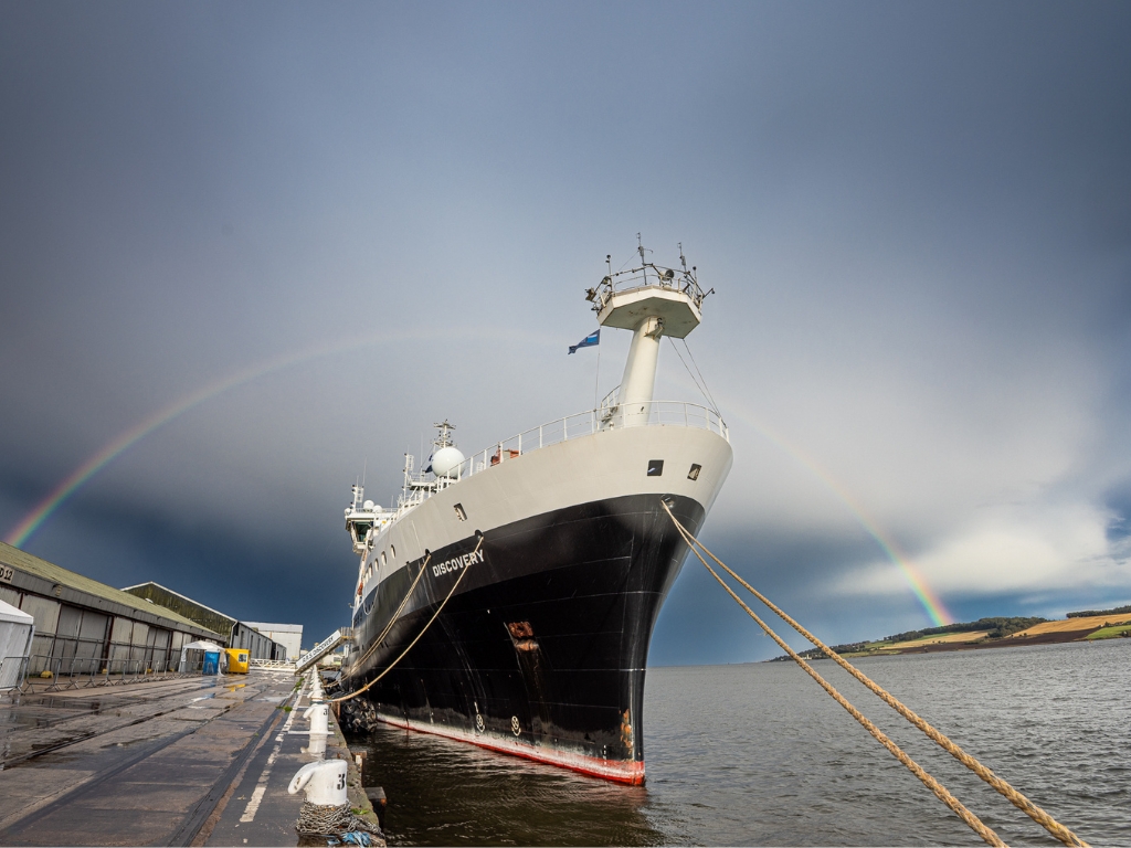 A rainbow forms above the RRS Discovery (2012), which is pictured in the port of Dundee