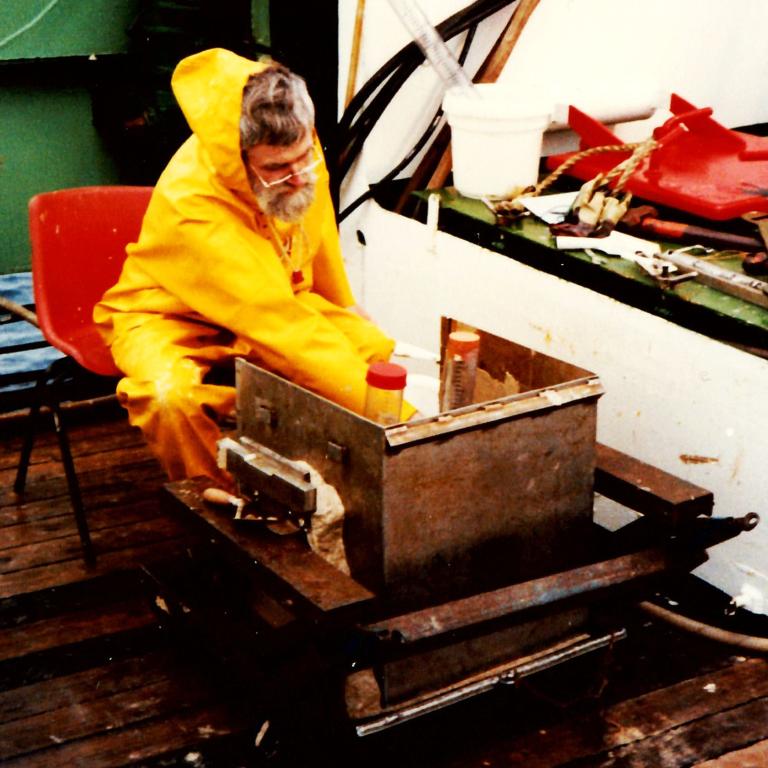 Mike sorting through samples on a 1991 voyage on RRS Challenger.