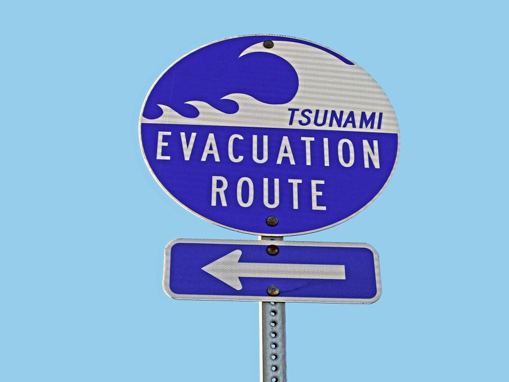 Tsunami Evacuation Sign (photo by John Cardamone on Unsplash)