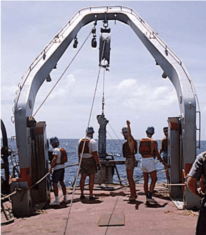 Image: Bob Hessler taking a spade box core sample in the Philippine Trench in 1975 