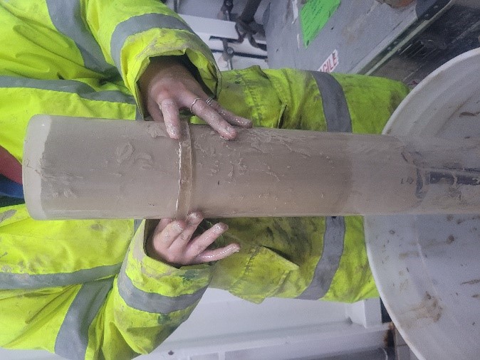 Side view of a sediment core sample showing the deep-sea mud collected